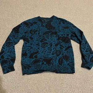 Ann Taylor blue crewneck sweater with black shimmery floral print